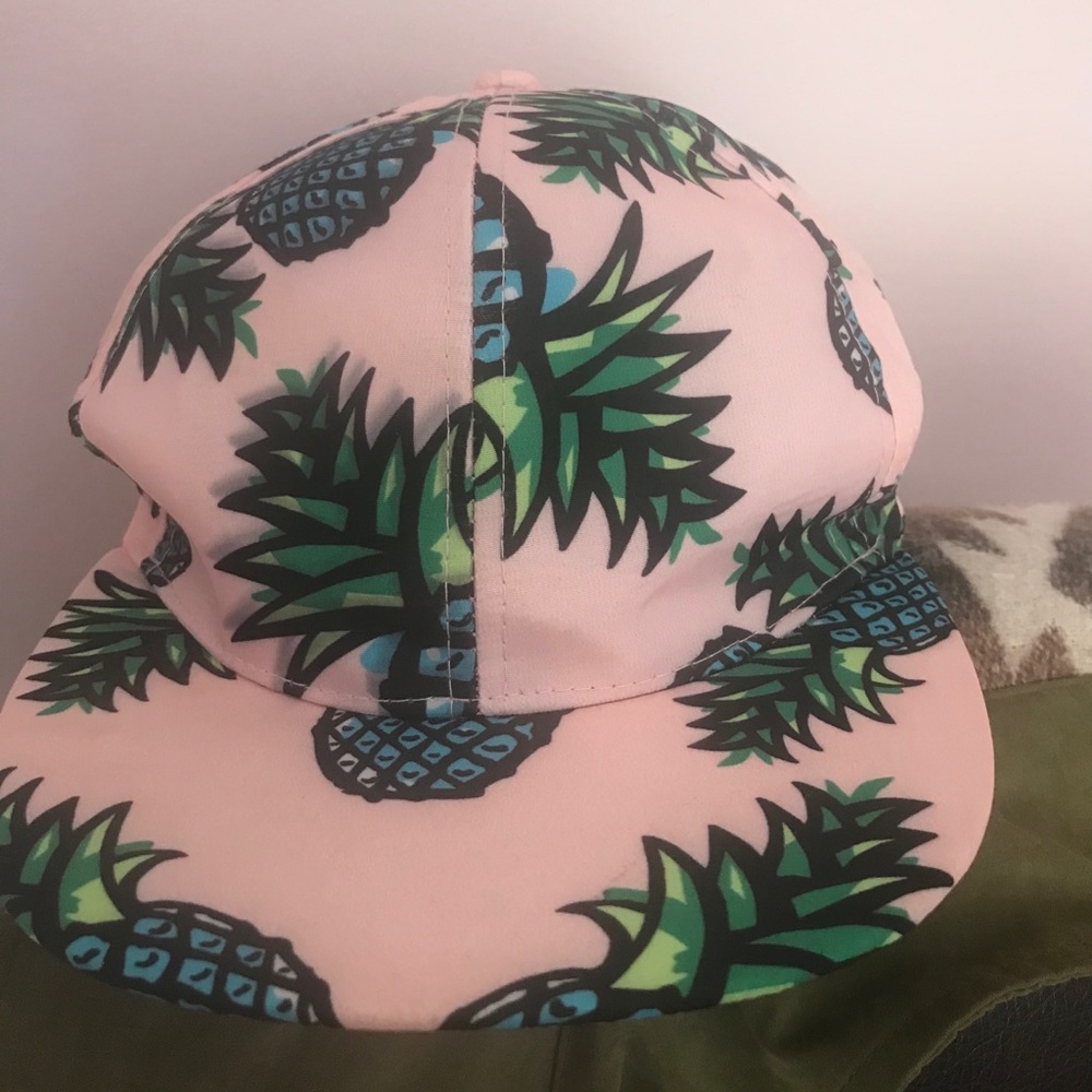 Pink pineapple trucker hat